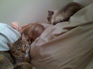 Bryan's being sneaky again.  My sleeping with Bella and Sweet Pea.